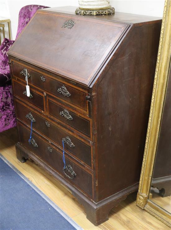 A George III inlaid mahogany bureau W.97cm